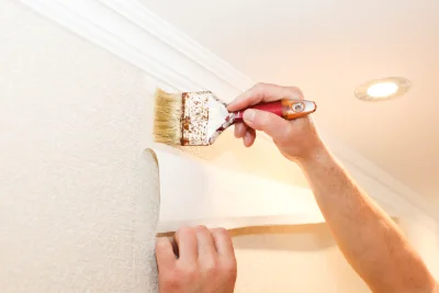 Pose de papier peint à Bomy — revêtements muraux et toiles de verre